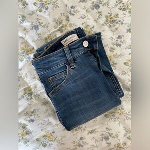 ASOS DESIGN Petite High Rise Lift and Contour Flare Jeans in Midwash